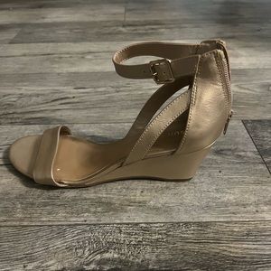 Gold sandals with a small wedge heel, by Sun and Stone, size 8.5